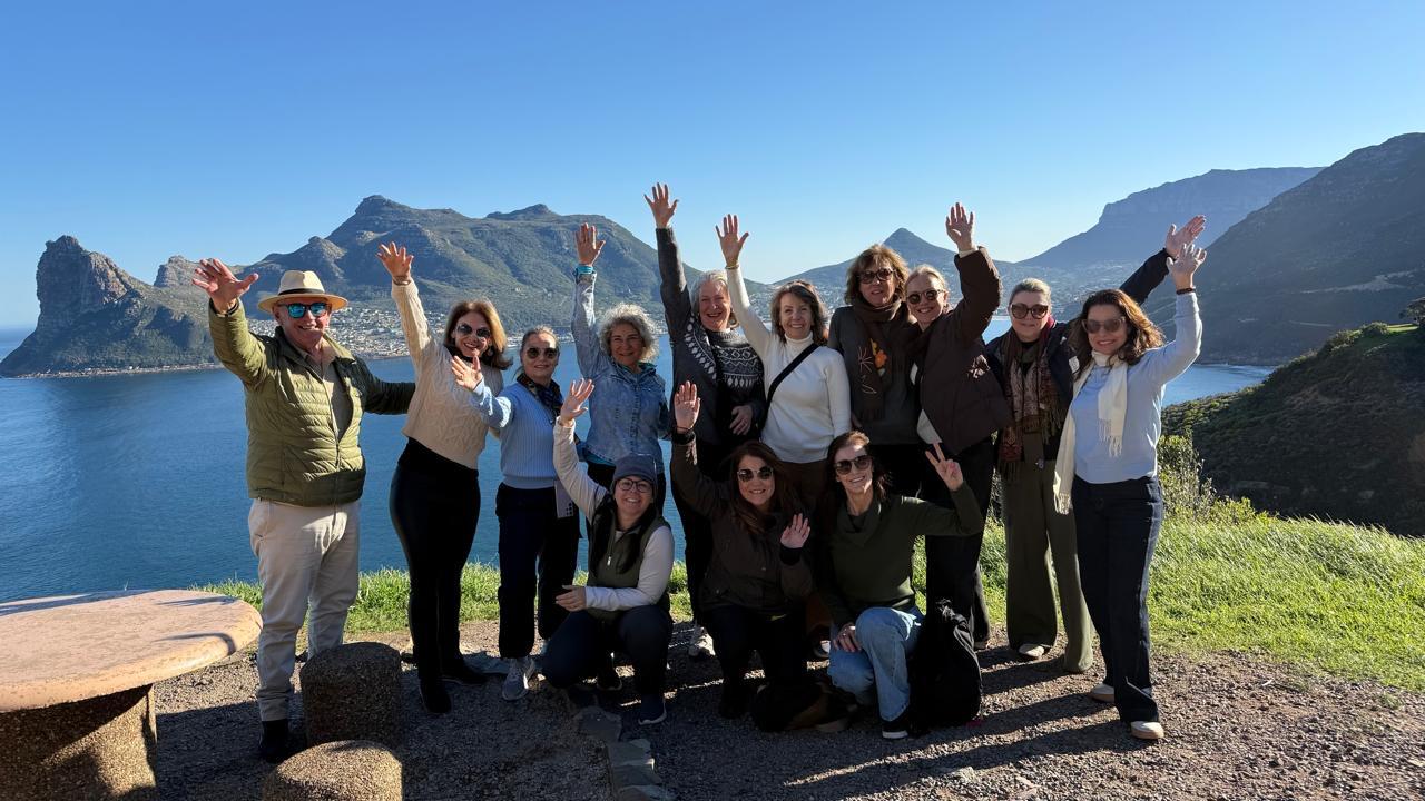 Grupo Elas pelo Mundo na costa da região de Cape Point